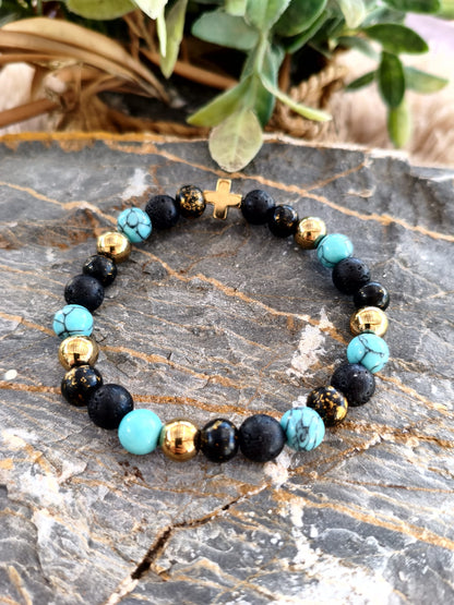 Pulsera "Golden Cross" – Turquesa, Piedra Volcánica y Oro Brillante