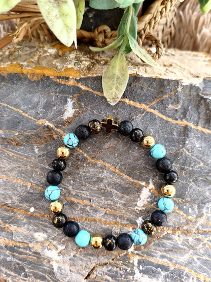 Pulsera "Golden Cross" – Turquesa, Piedra Volcánica y Oro Brillante