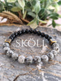 Pulsera "Anchor Grey" – Ónix y Jaspe Dálmata con entrepiezas Doradas