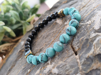 Pulsera "Pacific Anchor" – Turquesa, Ónix y Detalles Dorados